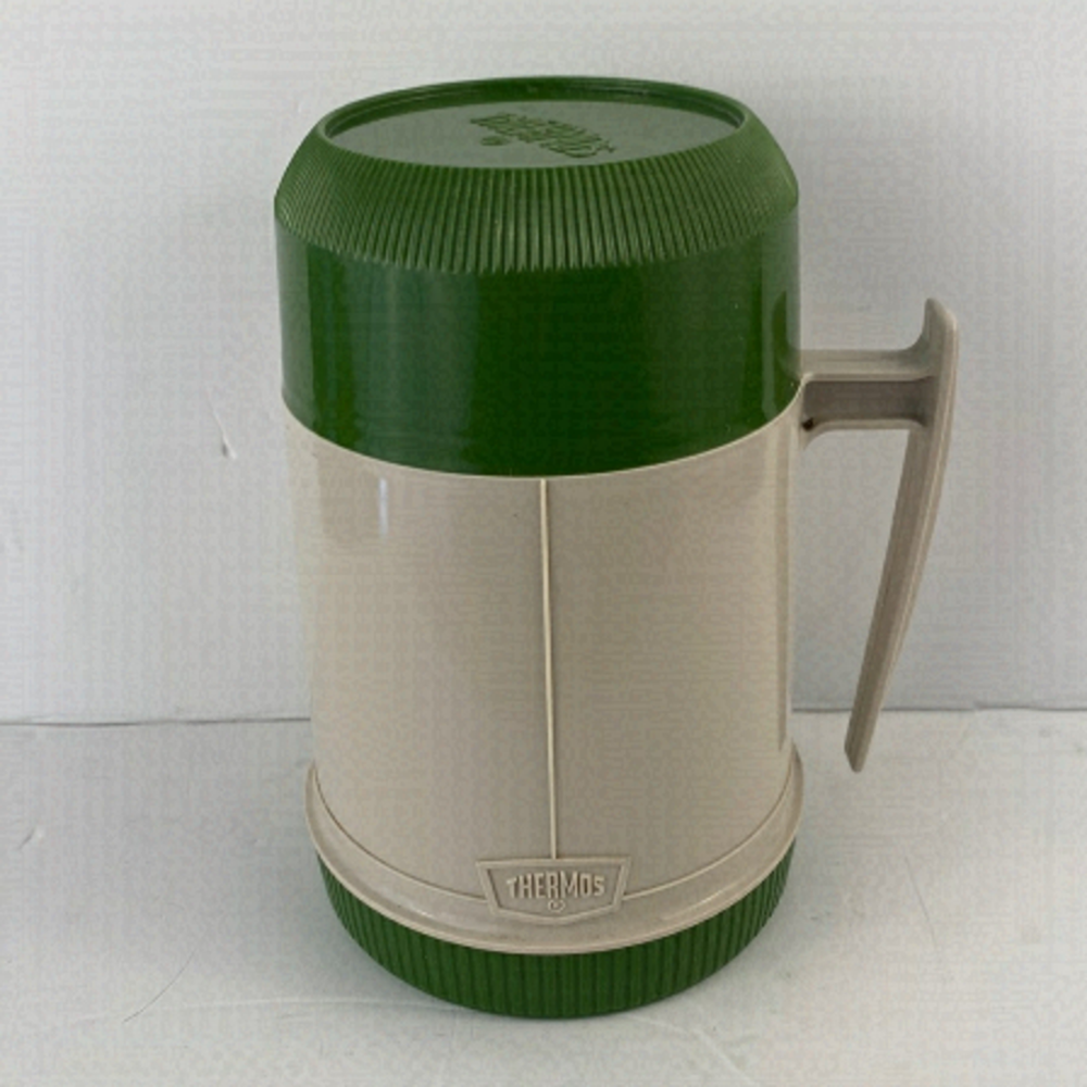 Vintage thermos green cream, 1.5 cup capacity glass liner handle.